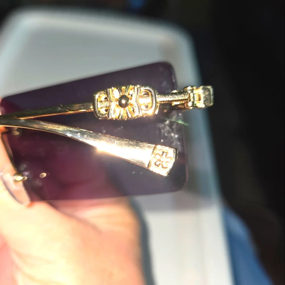 Gold and Purple Rimless Sunglasses